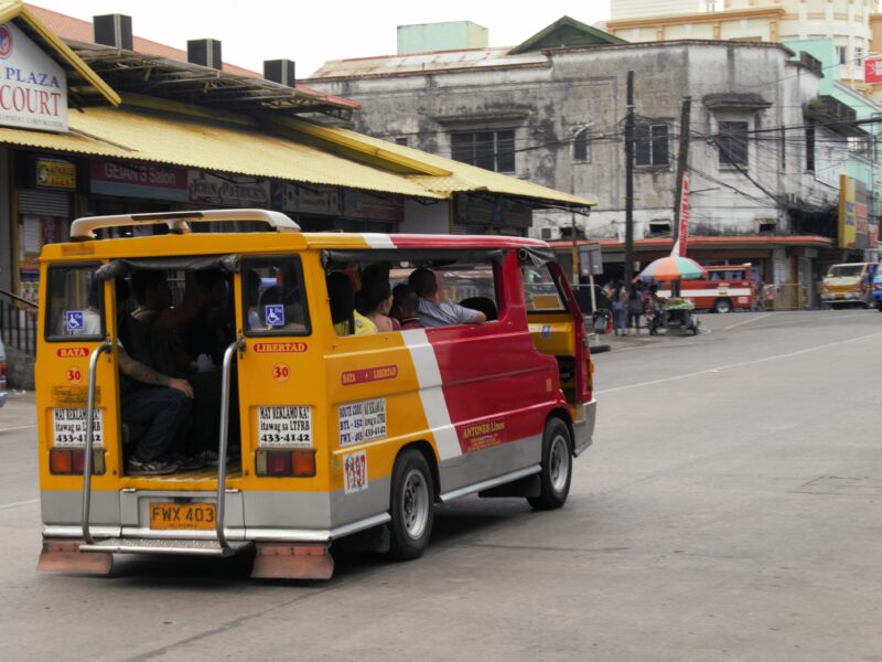 Yellow and red colored jeepney